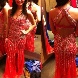 Beautiful salmon colored, beaded, prom dress